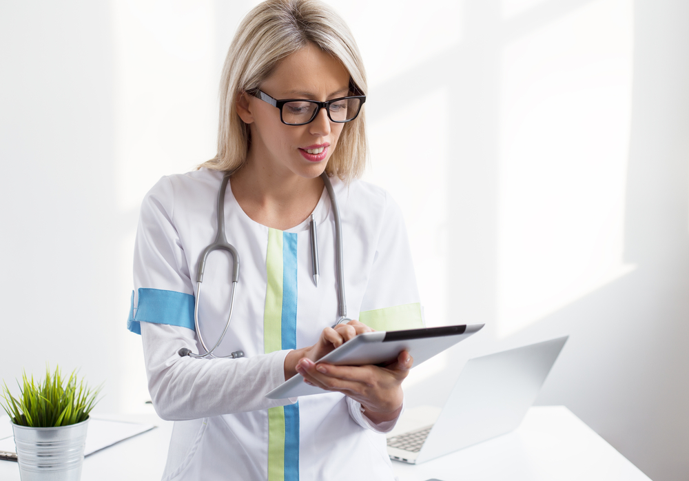 female doctor and tablet.jpg